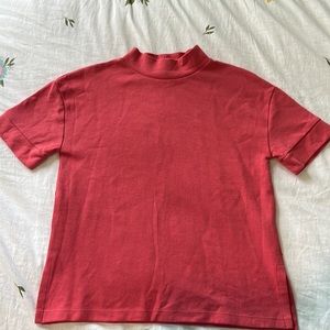 Pink Zara shirt with turtleneck.